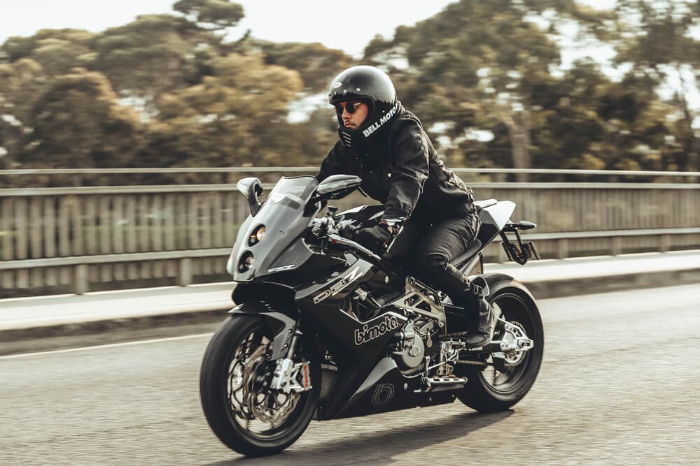 man showing proper motorcycle riding position