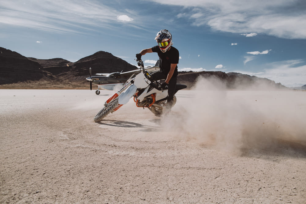 man doing motorcycle tricks