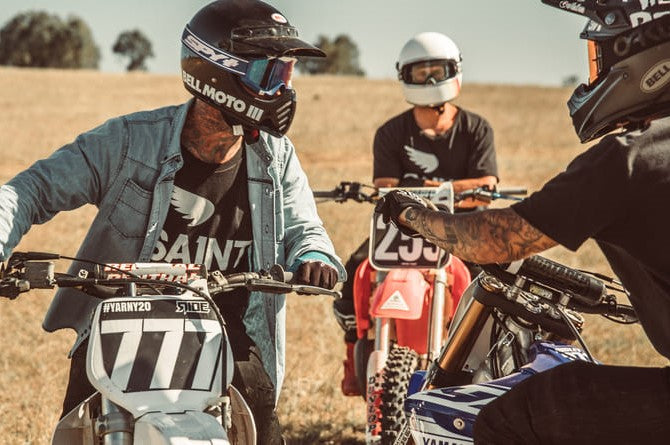 motorcycle bikers talking to each other