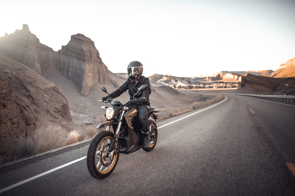 Motorcycle Rider Riding Into Distance The Ultimate Guide to Long Distance Motorcycle Riding Gear – SA1NT