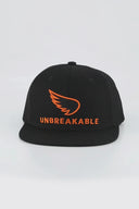 SA1NT Unbreakable Wing Trucker | Black/Orange